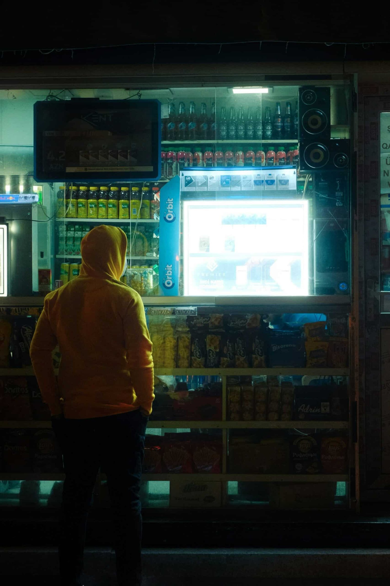 A person standing in front of a vending machine